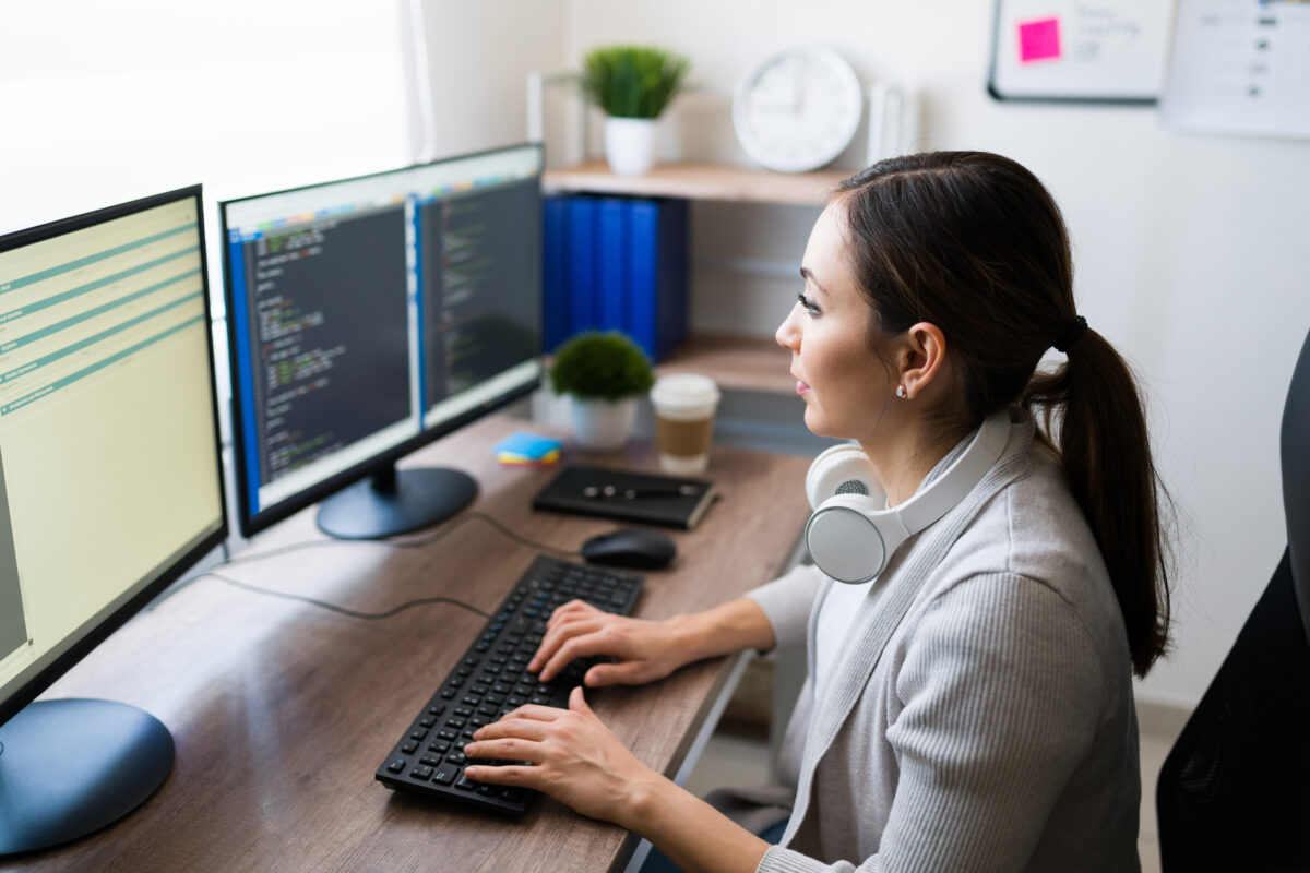 Side view of a freelance working at home from Chile