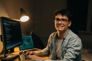 A nearshore AI Engineer working at his desk